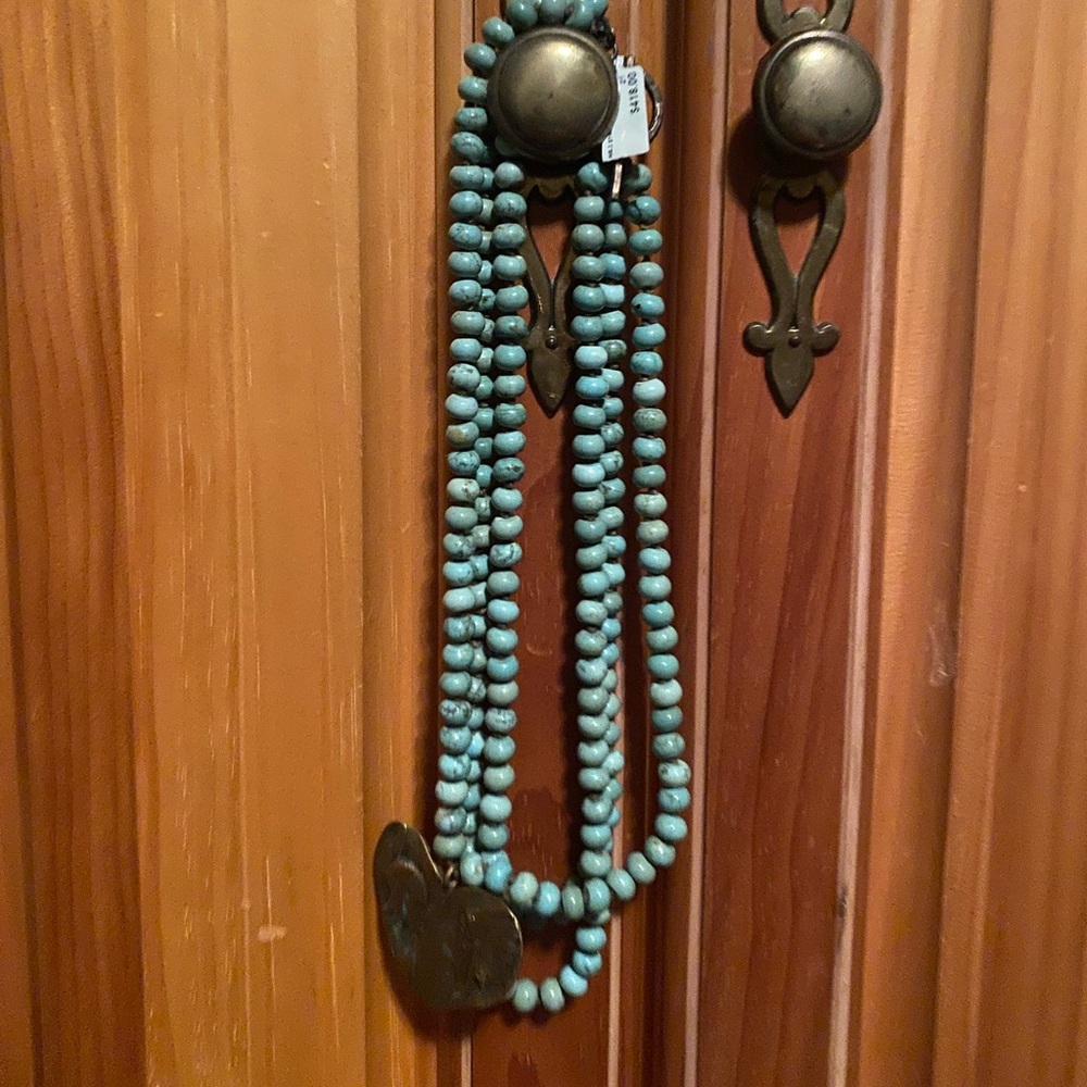 Authentic love tokens turquoise necklace with crystals.